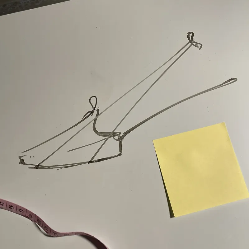 Line sketch beside a sticky note