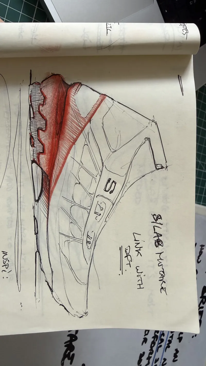 Red marker sketch on a pad